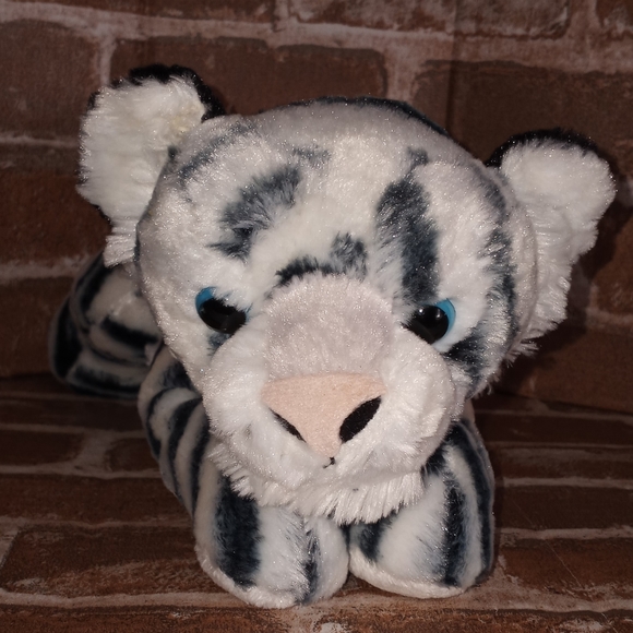 stuffed white tiger with blue eyes
